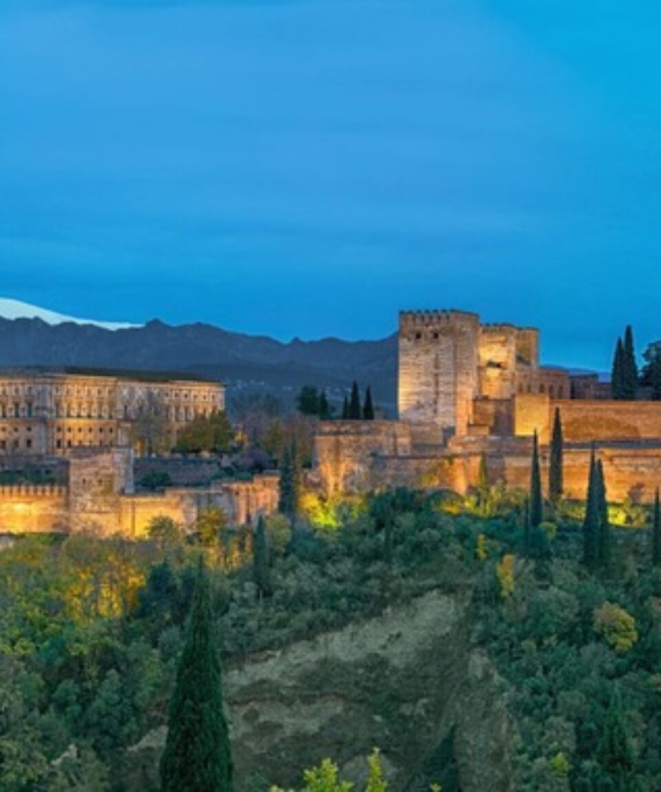 panorama-of-illuminated-alhambra-fortress-in-grana-2021-09-04-08-20-02-utc-scaled